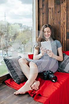 Young freelancer girl is working hard in laptop