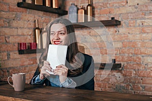 Young freelancer girl is working hard in laptop