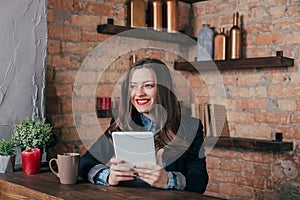 Young freelancer girl is working hard in laptop