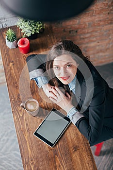 Young freelancer girl is working hard in laptop