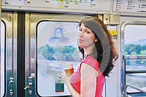 Young French woman in Parisian subway