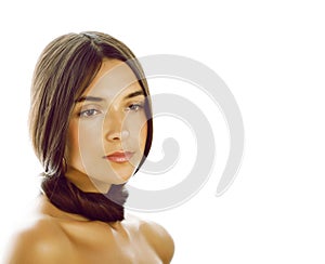 Young fresh brunette tann girl with beauty hairstyle isolated on white closeup, soft spa face