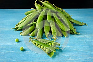 Young fresh juicy pods of green peas