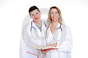 Young friendly medical team with book in lab coat