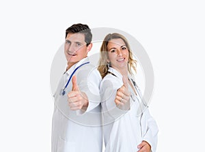 Young friendly medical team with thumb up