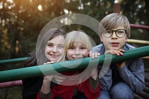 Young friends are fooling around outside on a sunny day