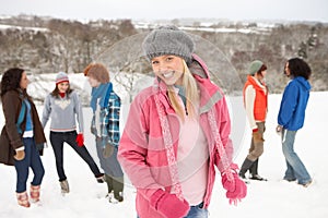 Young Friends Having Fun In Snow