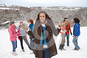 Young Friends Having Fun In Snow