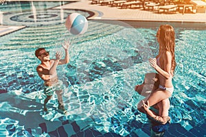 Young friends in swimming pool