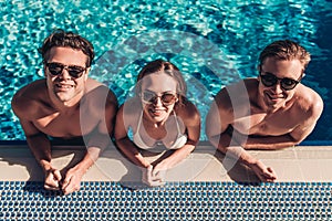 Young friends in swimming pool