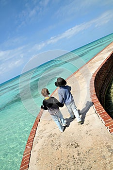 Young friends on tropical stroll