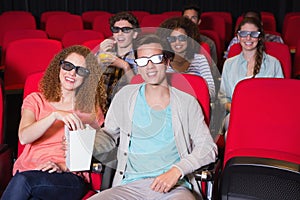 Young friends watching a 3d film