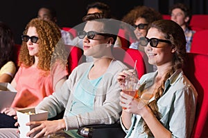 Young friends watching a 3d film