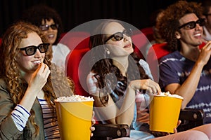 Young friends watching a 3d film