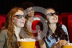 Young friends watching a 3d film