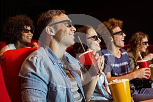 Young friends watching a 3d film