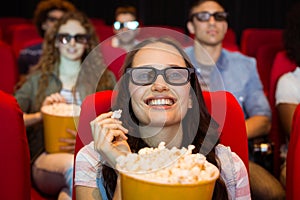 Young friends watching a 3d film