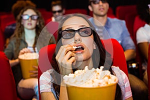 Young friends watching a 3d film