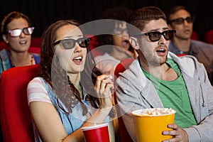 Young friends watching a 3d film