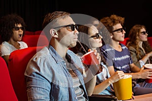 Young friends watching a 3d film