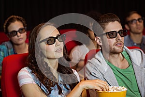 Young friends watching a 3d film