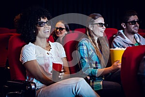 Young friends watching a 3d film