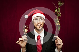 Young funny guy with christmas hat