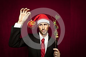 Young funny guy with christmas hat