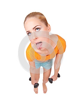 Young funny woman with dumbbells