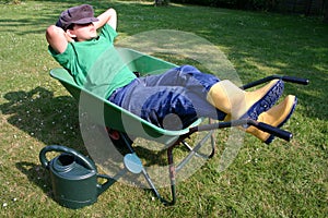 Young gardener having a break