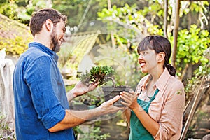 Young gardeners with bonsai