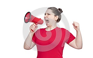 Young girl activist in a red t-shirt screaming into a megaphone, isolated on white background