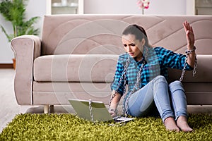 The young girl addicted to laptop computer and internet