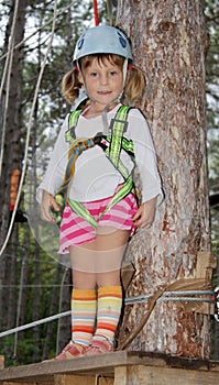 Young girl in adventure park