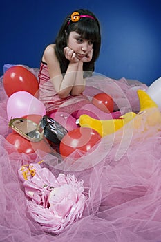 Young girl angry on her doll photo