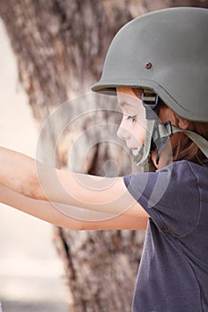 Young girl with army hat