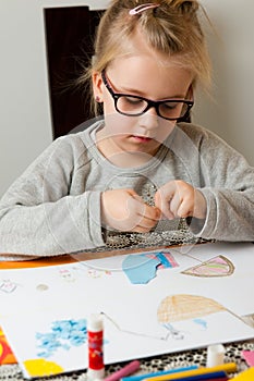 Young girl with art project