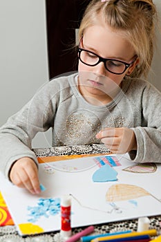 Young girl with art project