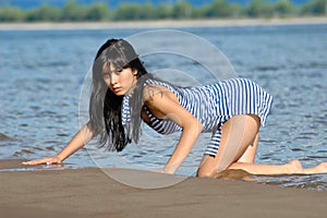 The young girl on a beach