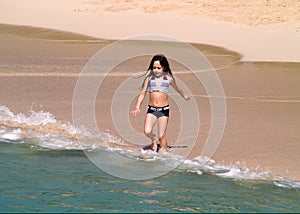 Young Girl On Beach