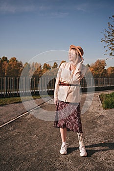 A young girl with a bionic prosthesis on the street.