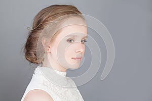 Young Girl with Boho Hairstyle. Profile