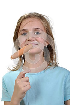 Young girl with boiled hot dog