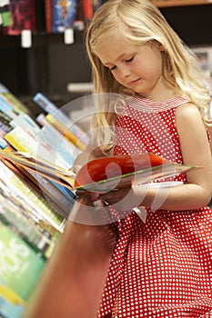 Young girl in bookshop