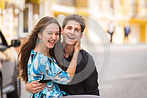 A young girl and boy of the beautiful city