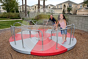 Young Girl and boy on Playground