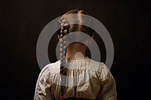Young girl with braided hair. Braid model back photo. Generated AI.