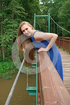 Young girl on bridge