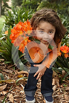 Young girl with a bunch of lilies