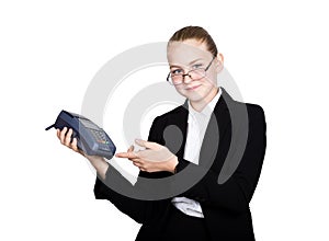Young girl in a business suit, offers e-card to pay for purchases